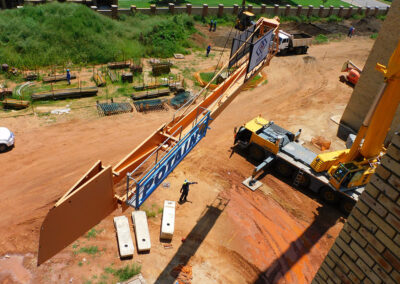 Dismantling of a Potain MDT 178 tower crane; here you see the counter jib being lowered.
